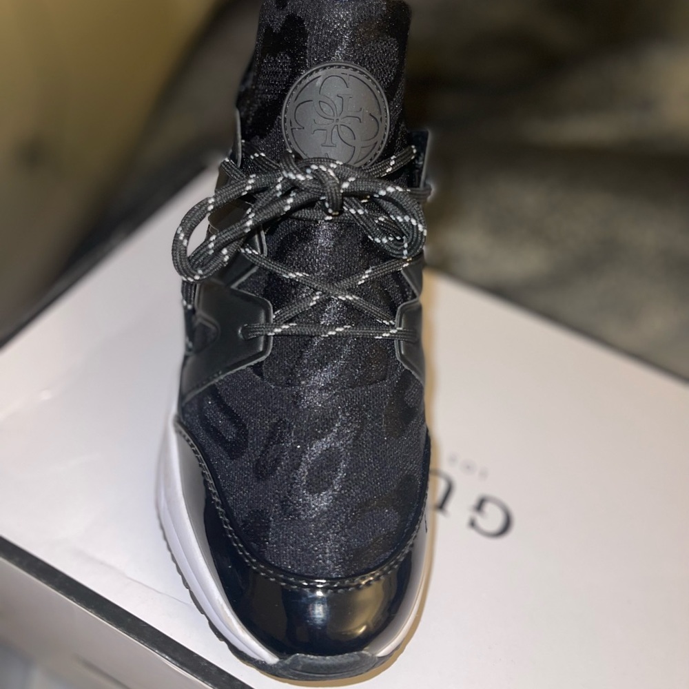 All black gym shoe. They are a size 6 never worn